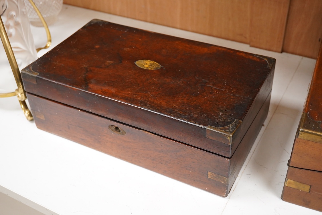 A Victorian walnut rising slope together with a rosewood writing slope